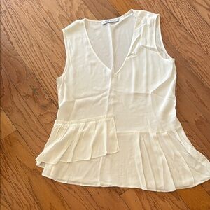 Cream Asymmetrical Pleated Sleeveless Blouse